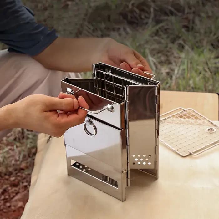 Réchaud à bois pliable compact en acier inoxydable pour camping en plein air